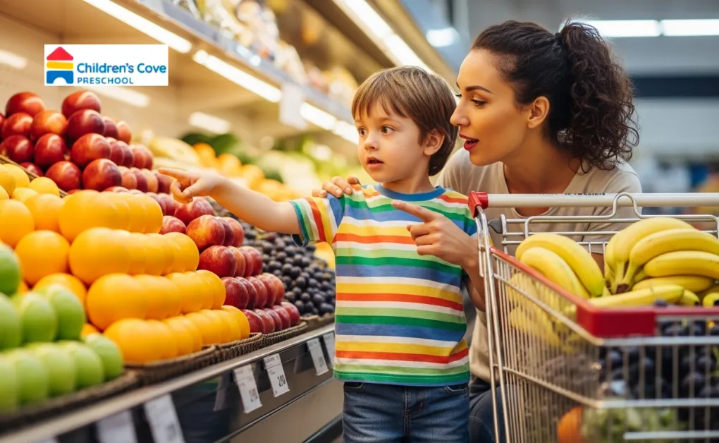 A parent and preschooler talking and learning new words together in a supermarket aisle